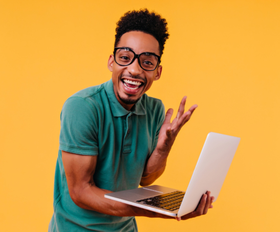 handsome-male-freelancer-glasses-smiling-ecstatic-african-student-holding-laptop-expressing-happiness