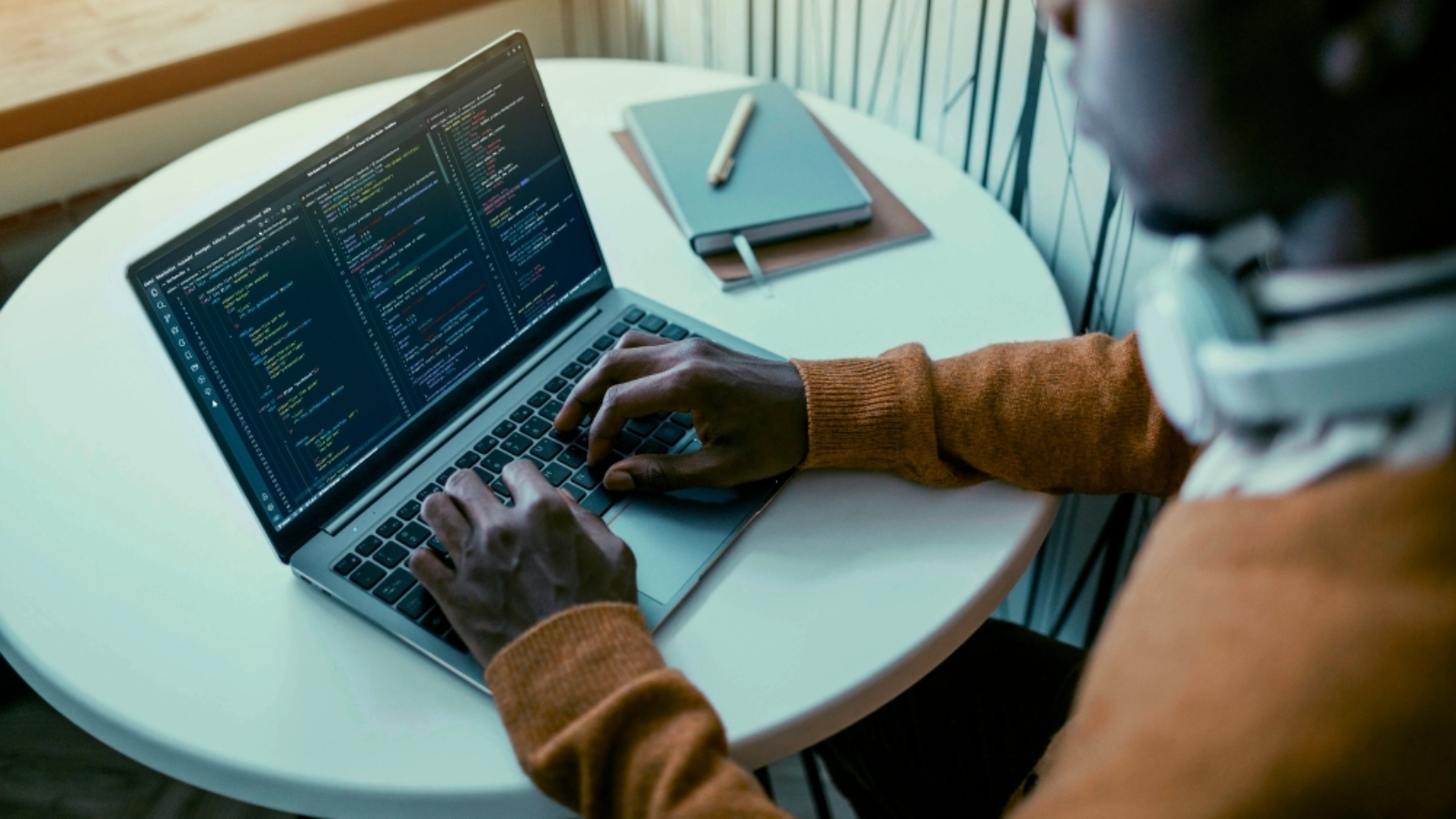 high-angle-man-working-laptop